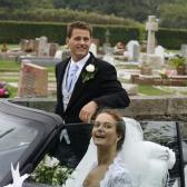 Miles and Vix outside the church