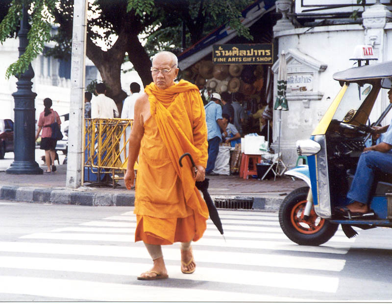 Monk with umbrella
