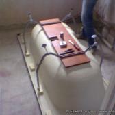 The new bath goes in