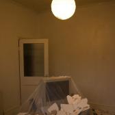 The polyester ceiling tiles have to go